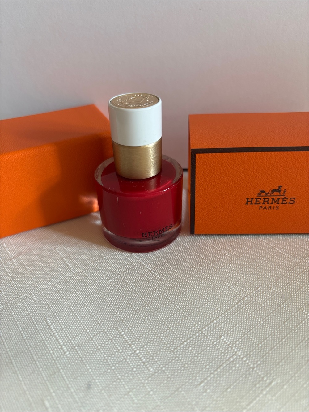 Hermès Red Nail Polish with Gold & White Cap